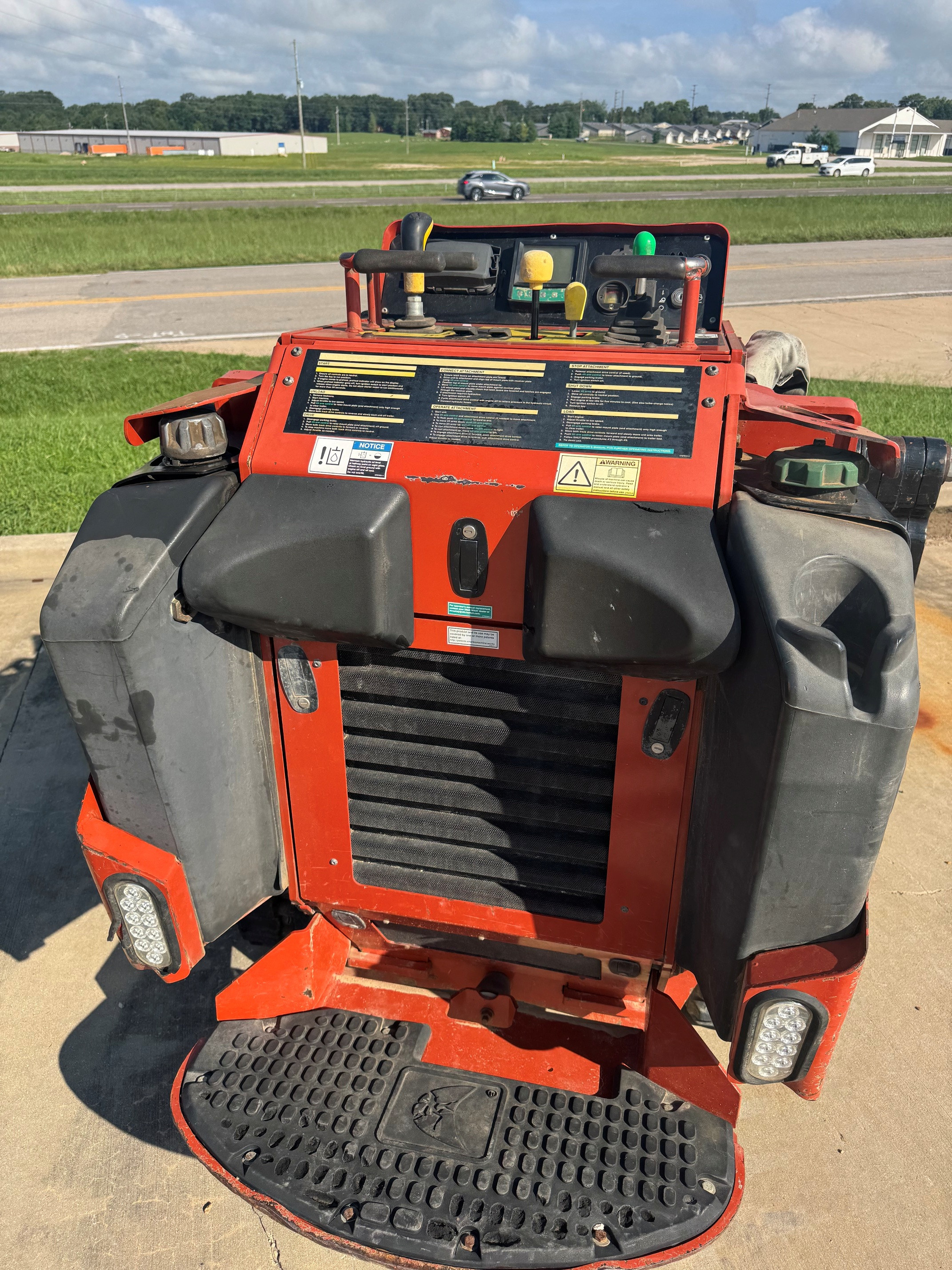 2018 Ditch Witch SK1550 with weight kit and brush guard.